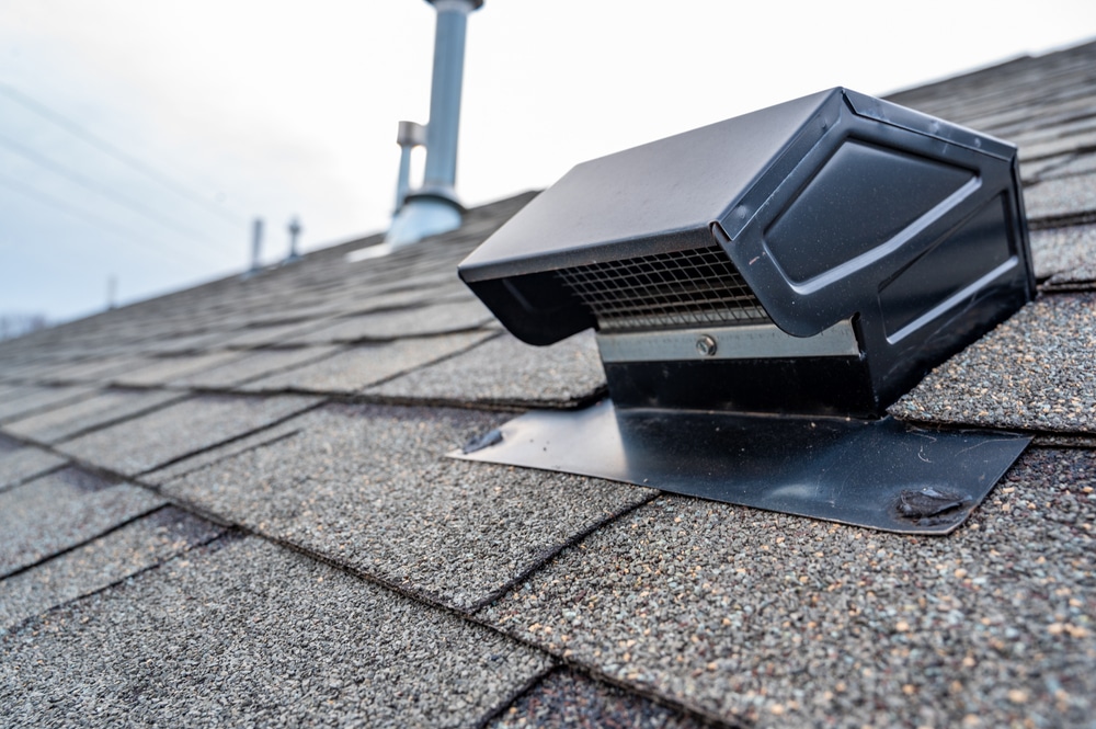 Ventilation. typical static passive vent installation on a residential roof.