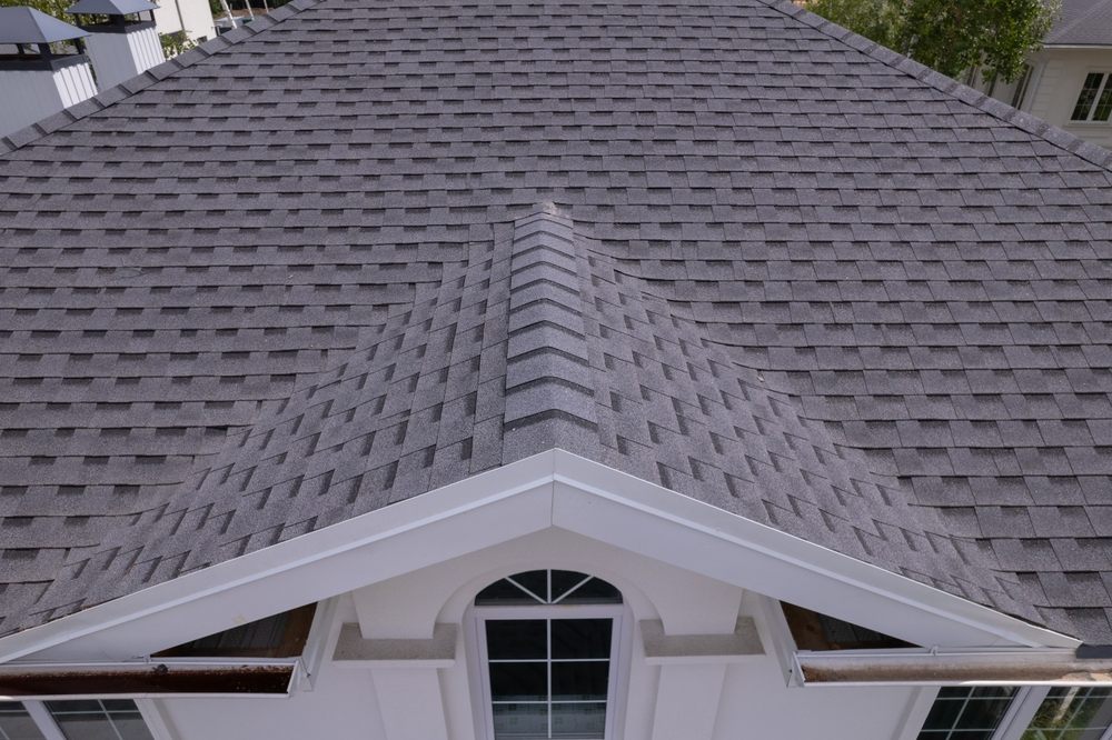 Asphalt Shingle Roofing Services In Ottawa. Shingles texture - close up view of asphalt roofing shingles.